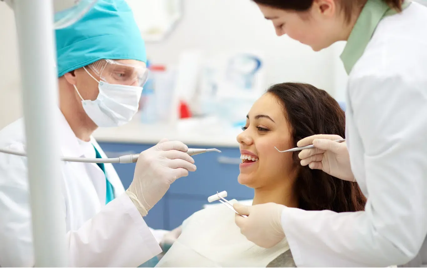 Dental team caring for a patient